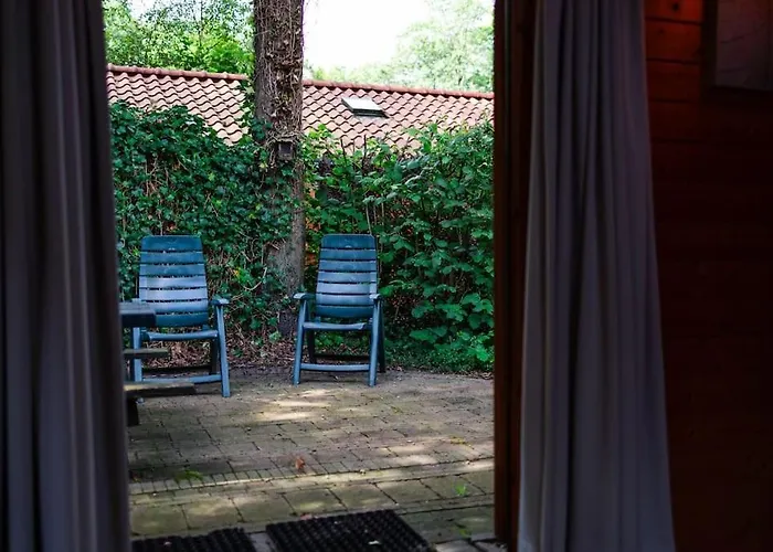 Holiday home Sfeervol Houten Met Omheinde Tuin Op De Veluwe *